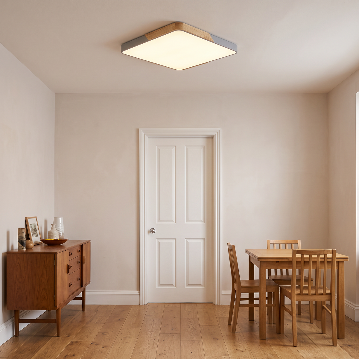 Mavon silver grey 50cm x 50cm slim LED flush mount ceiling light in a dining room