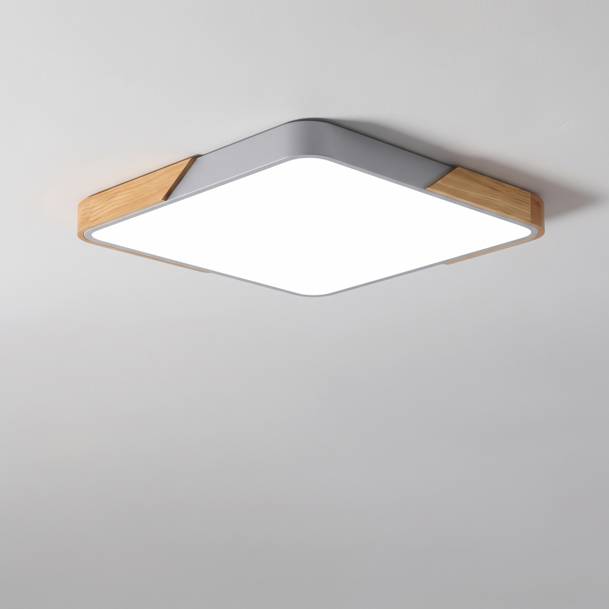 Mavon silver grey square slim LED flush mount ceiling light with wood corner trim, fitted flat to a ceiling