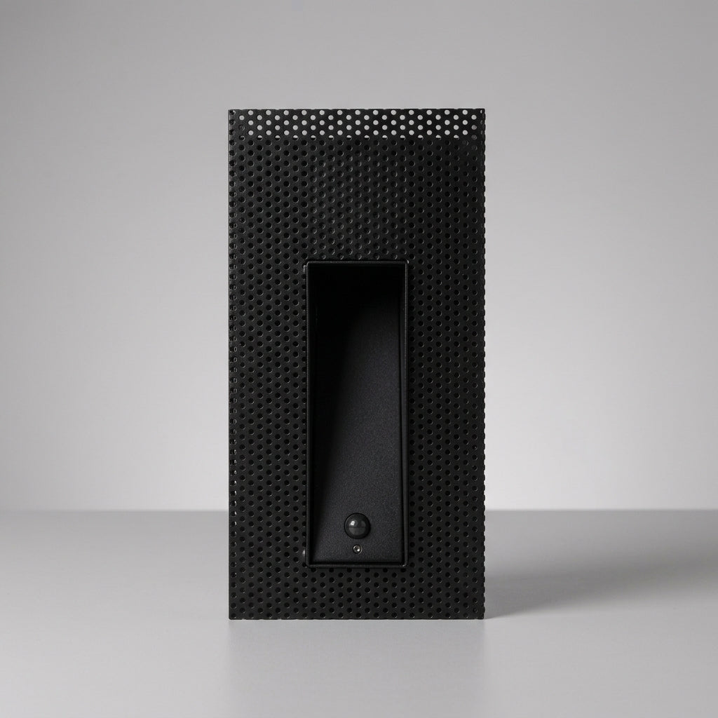 Melte black long strip perforated recessed LED wall light with a motion sensor, studio view