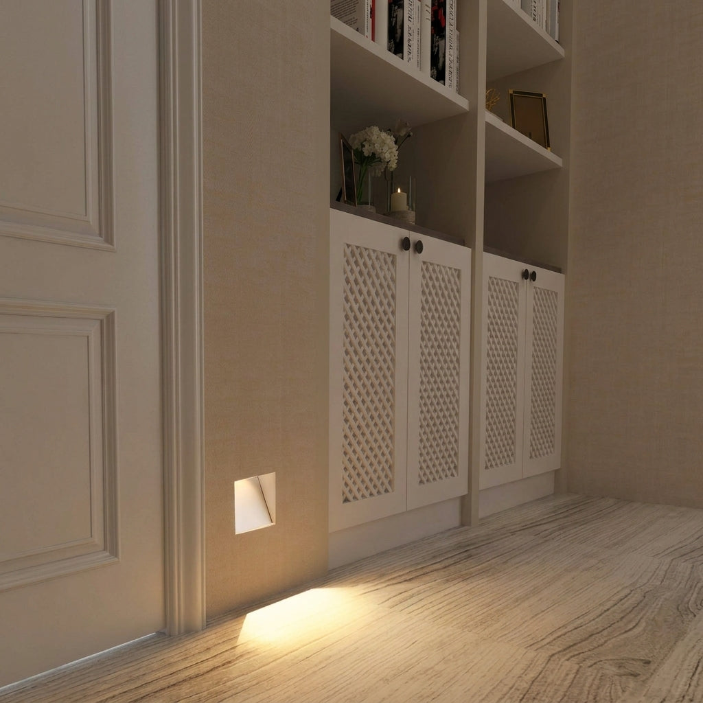 Melte recessed LED wall light lighting the floor of a hallway with built-in cupboards