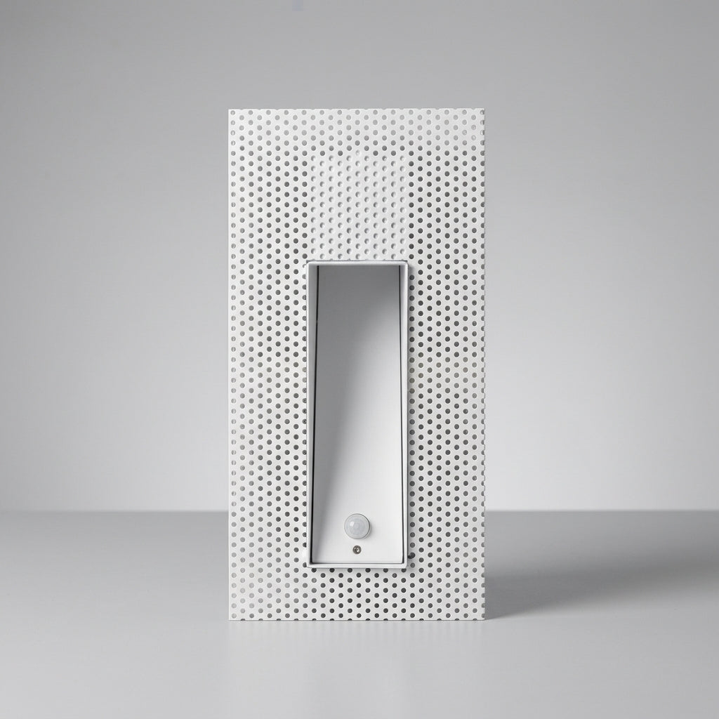 Melte white long strip perforated recessed LED wall light with a motion sensor, studio view
