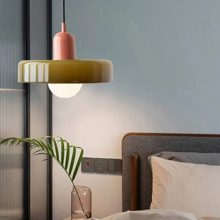 Pink and green colour-block mera pendant lamp styled as an elegant, space-saving bedside reading light