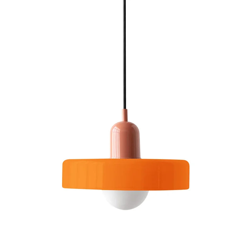 Pink and orange glass dome mera pendant light isolated on a clean white background