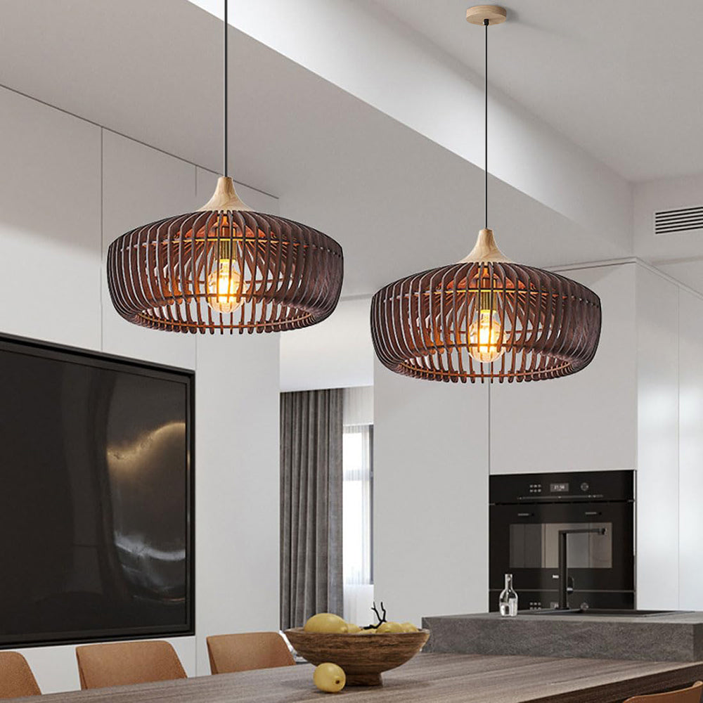 Two walnut slatted wood mexi pendant lights illuminating a contemporary kitchen and dining space