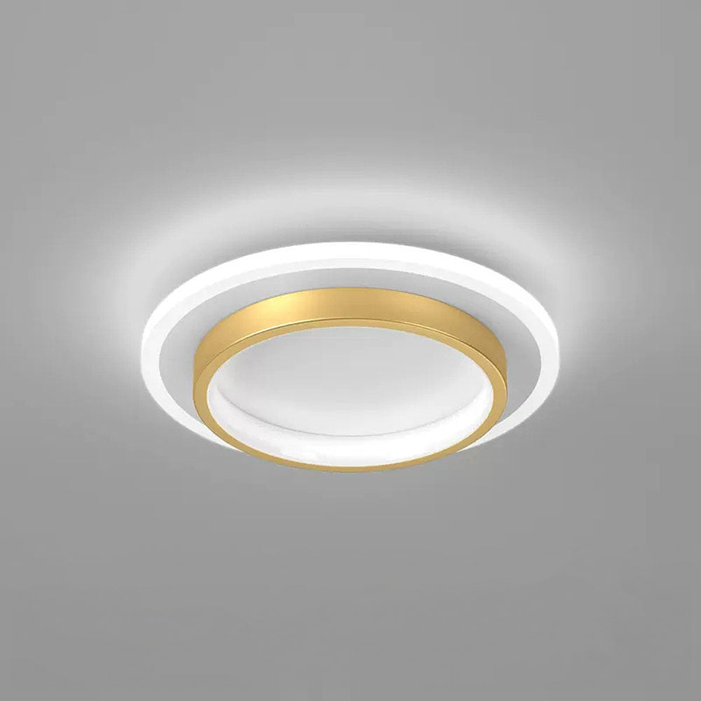 Minimalist gold double-ring LED mura ceiling fixture glowing against a grey background
