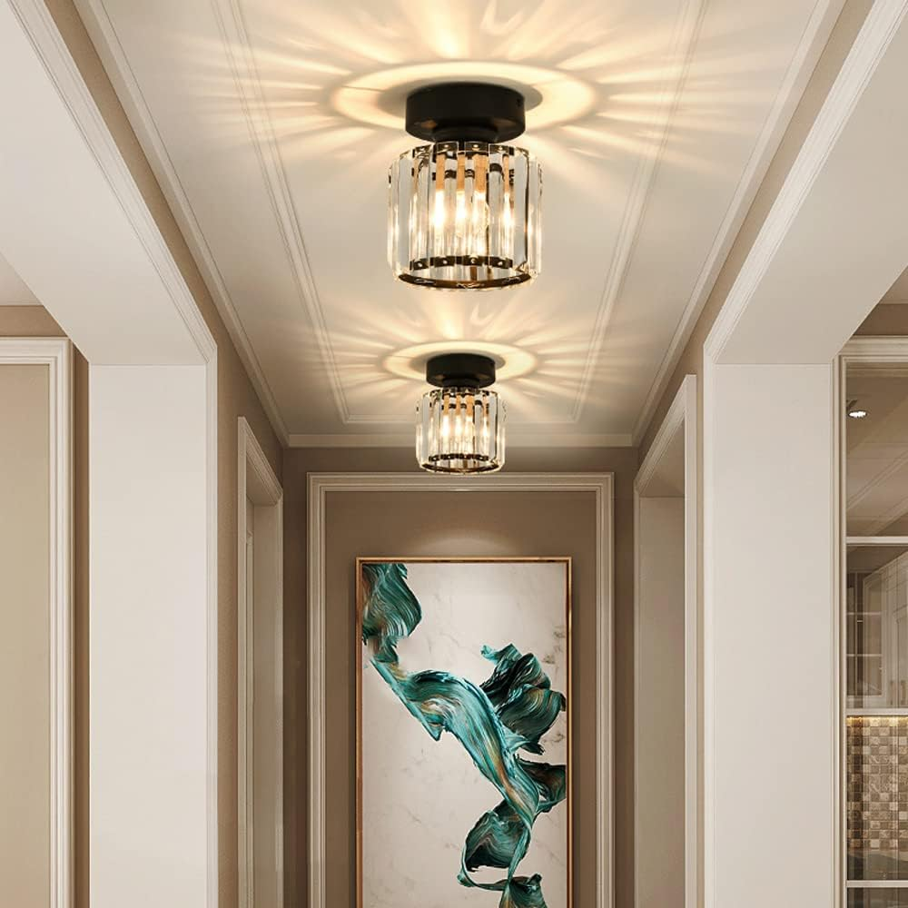 Two black round crystal prism flush mount netyf ceiling lights in a bright contemporary hallway
