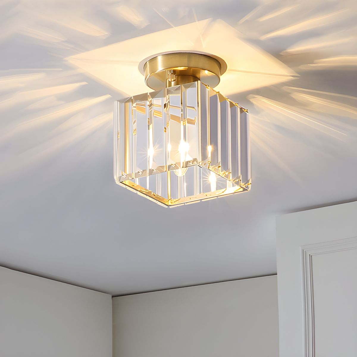 Close-up of the glowing gold square crystal netyf ceiling lamp showing the beautiful light refraction