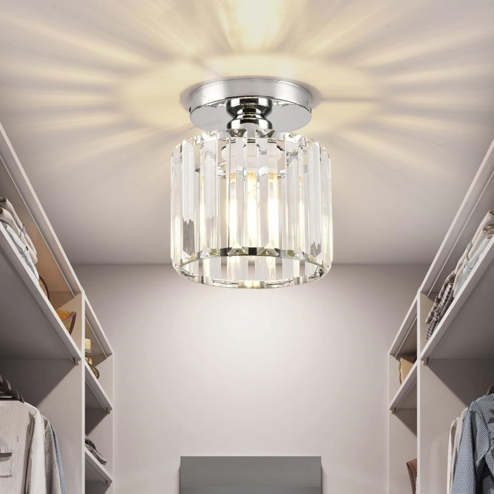 Silver round crystal mini netyf chandelier providing bright light in a modern walk-in wardrobe
