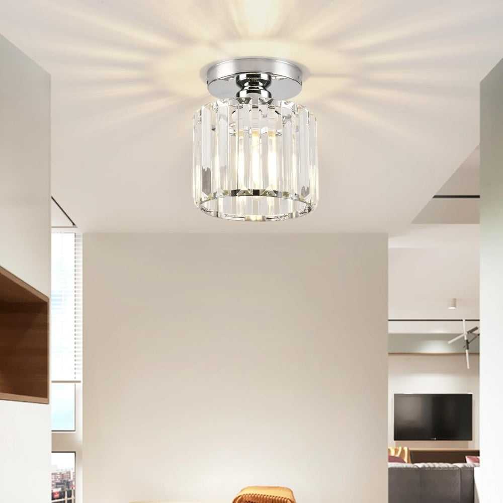 Silver round crystal netyf ceiling fixture adding elegance to a bright, spacious modern room