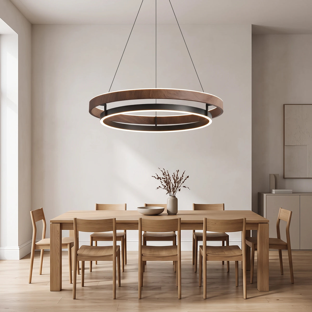 Nyles wood-grain two-ring LED chandelier hanging high above a large oak dining table with 6 chairs