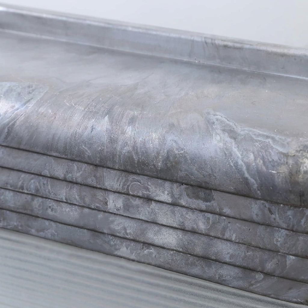 Close-up of the Ostin louvred hood and silver oxide aluminium finish