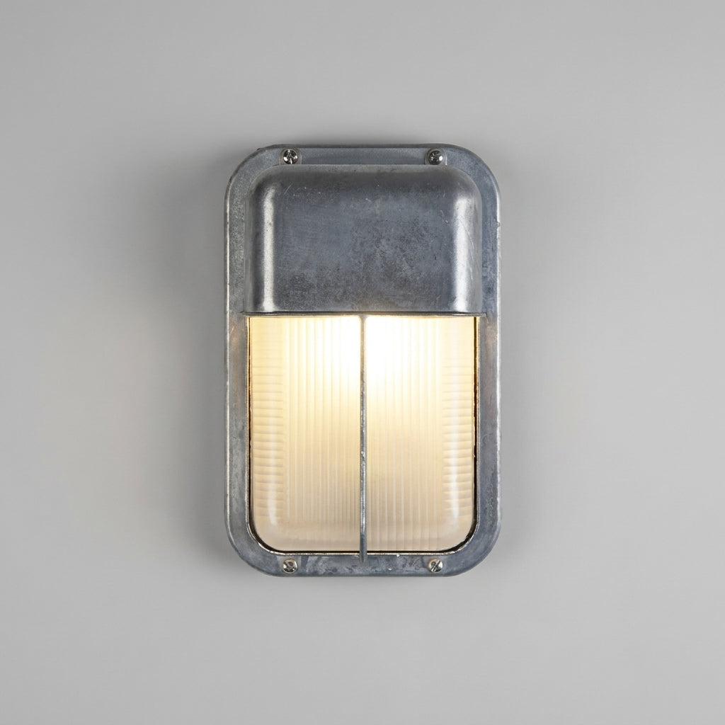 Ostin portrait centre bar hood bulkhead wall light lit on a grey wall