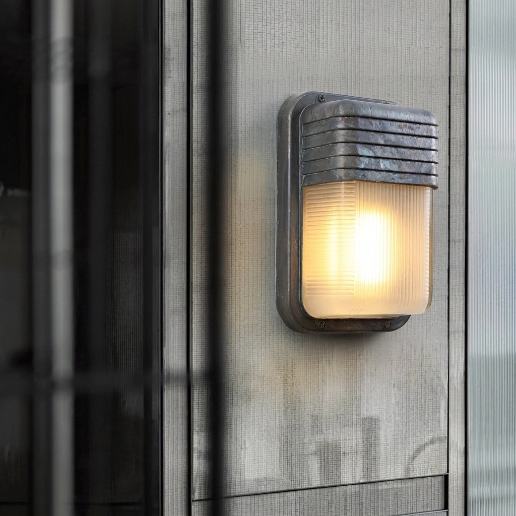 Ostin portrait louvred hood bulkhead wall light lit on dark grey cladding