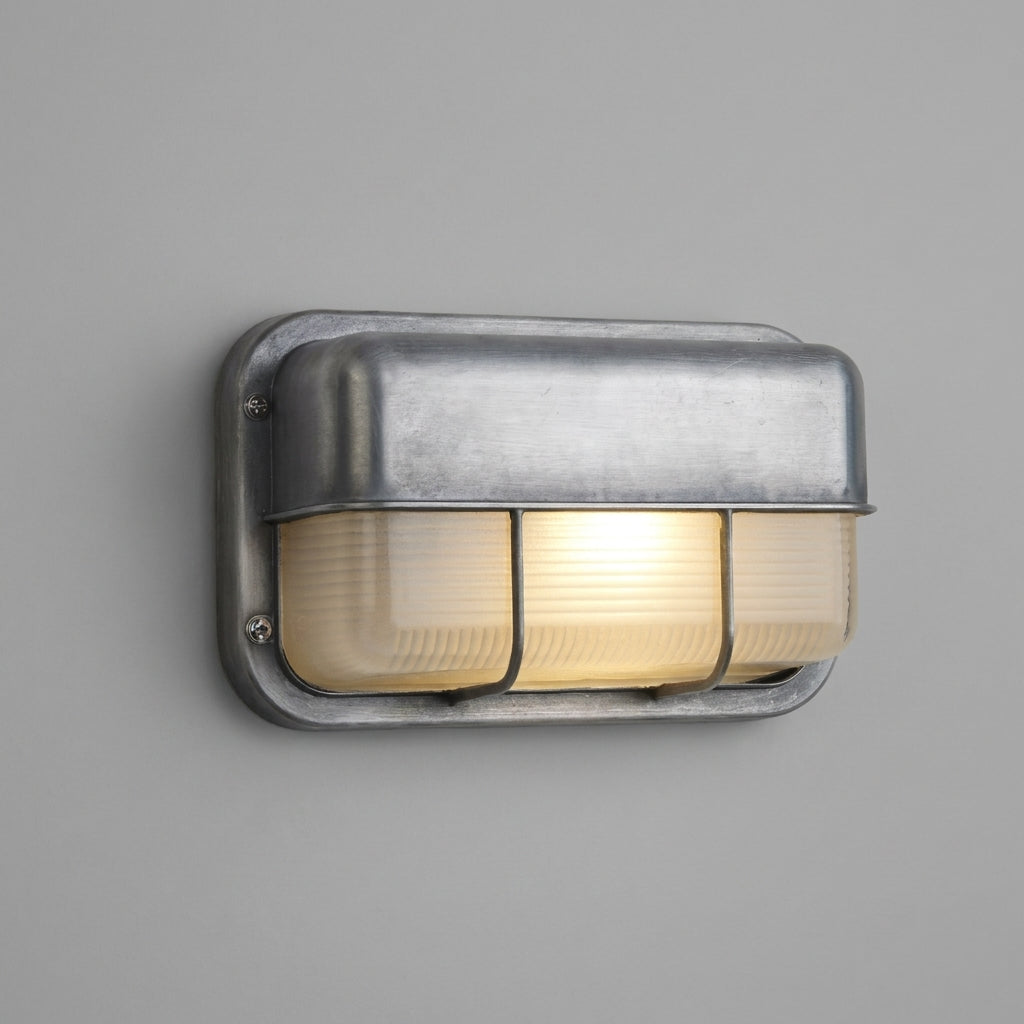 Ostin landscape twin bar hood bulkhead wall light lit on a grey wall