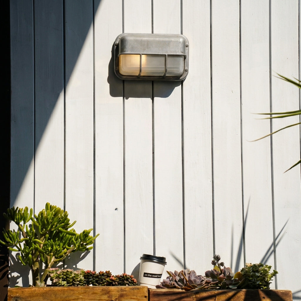 Ostin landscape twin bar hood bulkhead wall light on white timber cladding above planters