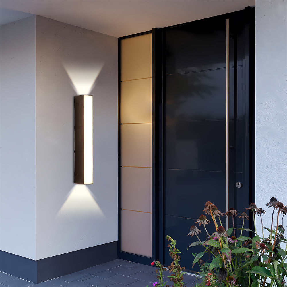 Sleek peqi linear LED porch light installed next to a modern black front door entryway