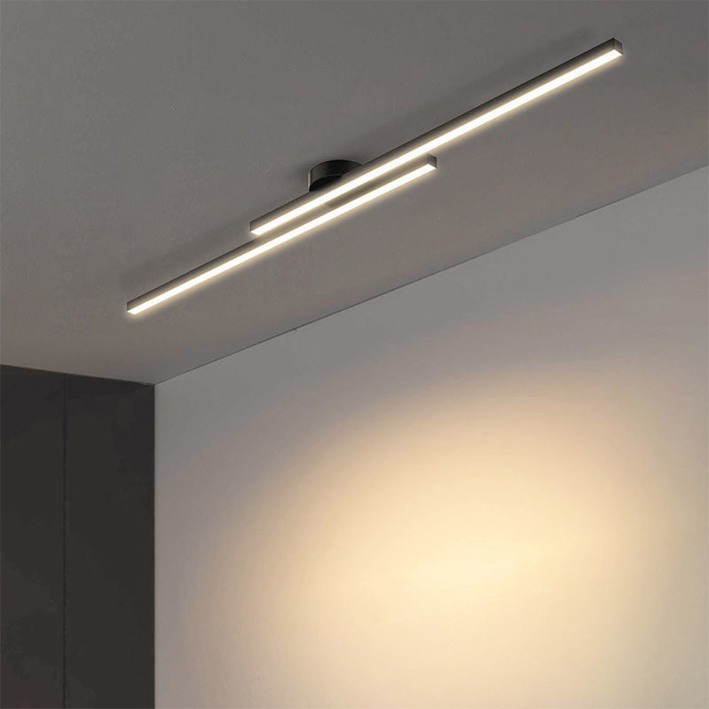 Modern black linear LED flush mount poxu ceiling light casting a warm, inviting glow