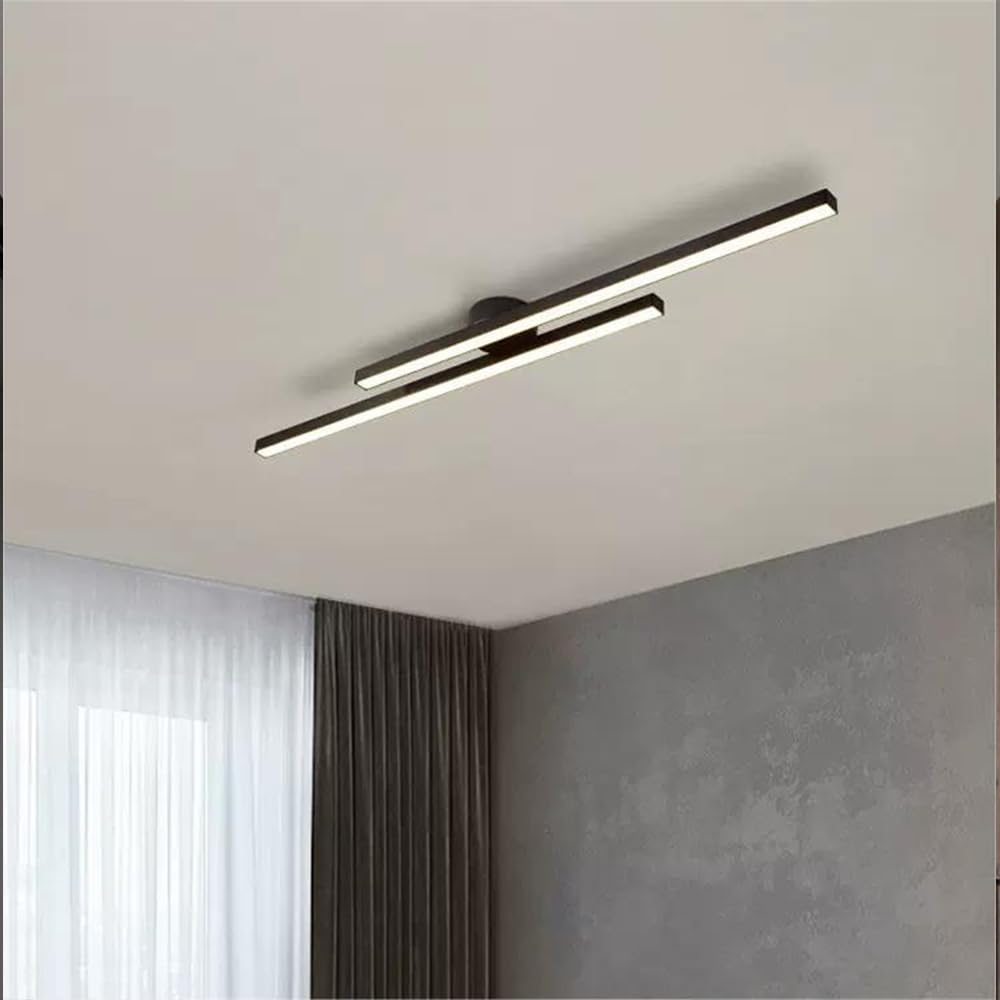 Black linear poxu LED lamp providing bright, even illumination in an open-plan living room