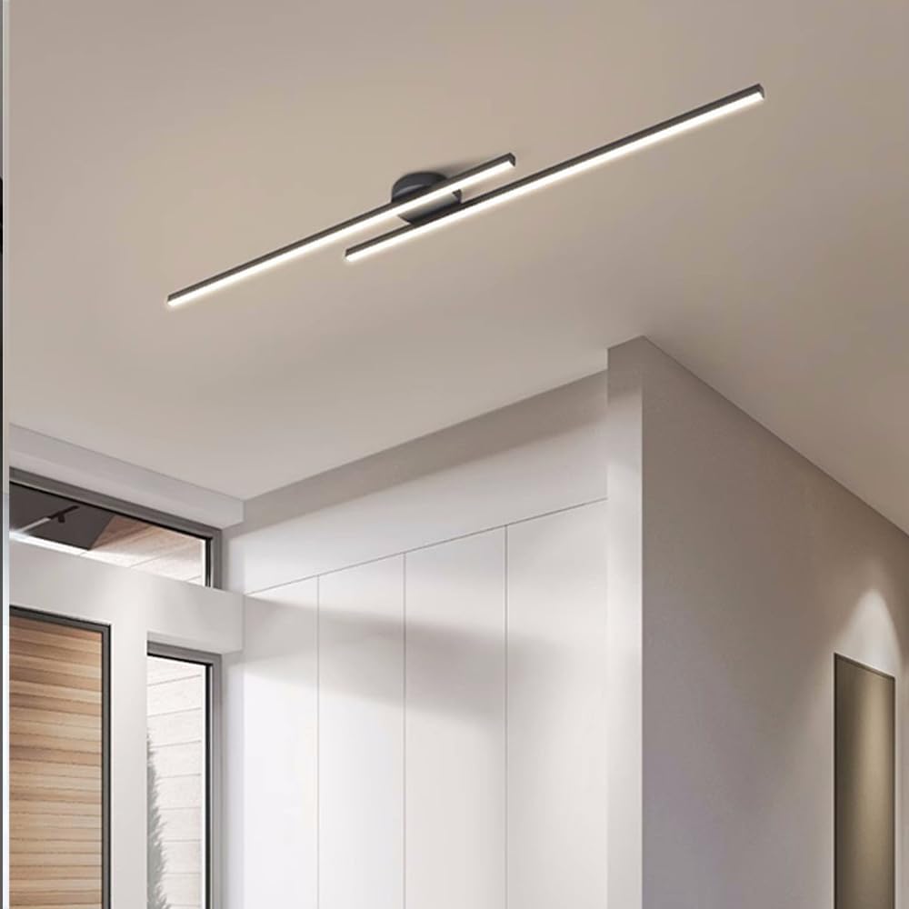Black minimalist staggered poxu ceiling lighting installed in a contemporary home corridor