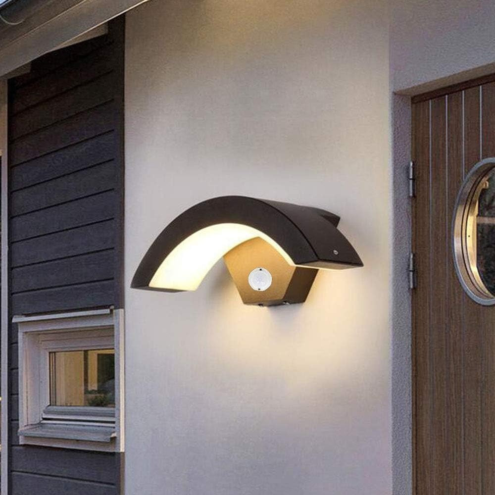 qaxo black arched exterior sconce with motion sensor installed on a modern home facade