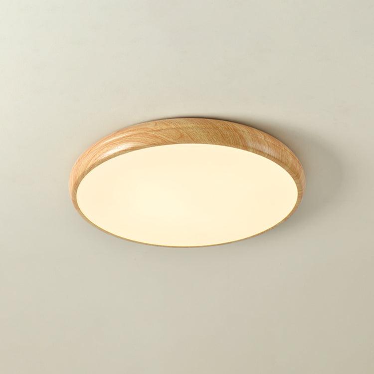 Front view of the curved light oak wood-effect LED qexi ceiling light