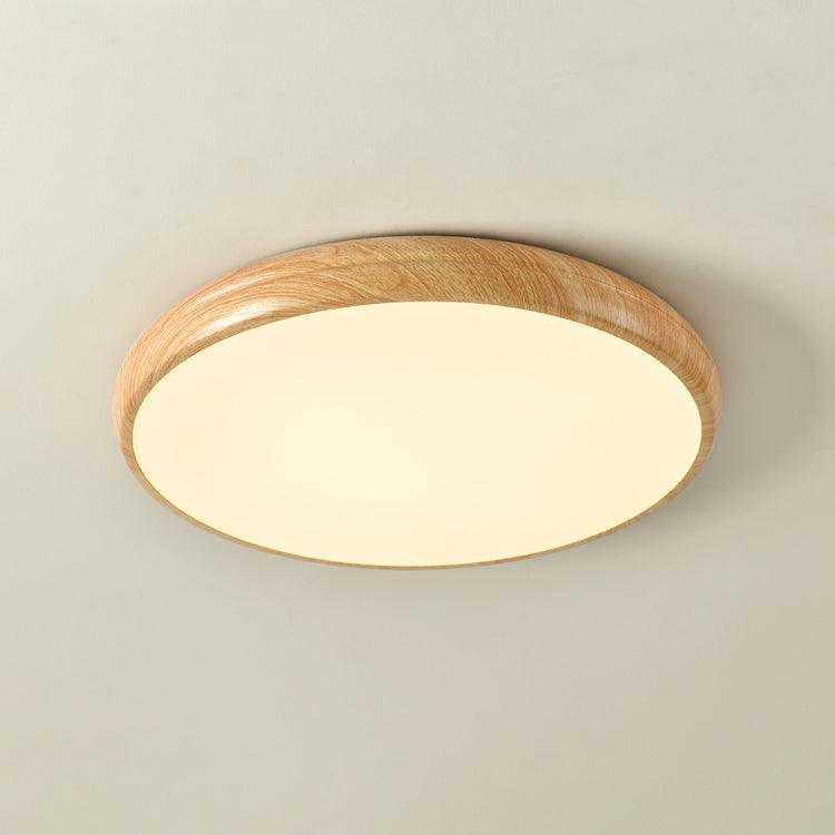 Front view of the curved light oak wood-effect LED qexi ceiling light