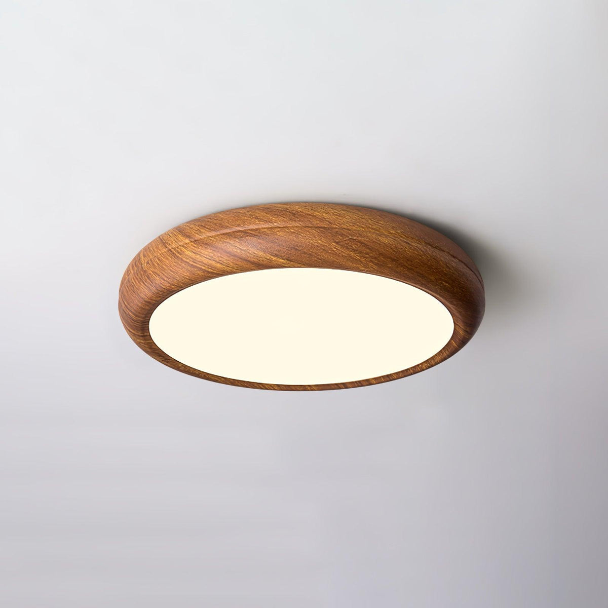 Front view of the curved walnut wood-effect LED qexi ceiling light