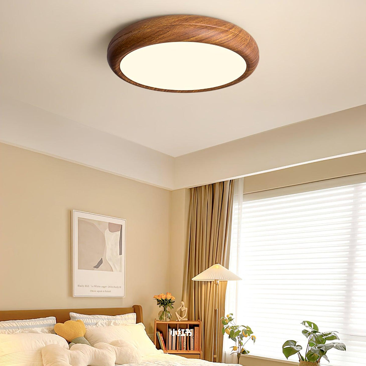 Curved walnut wood-effect qexi LED flush mount above a modern bed