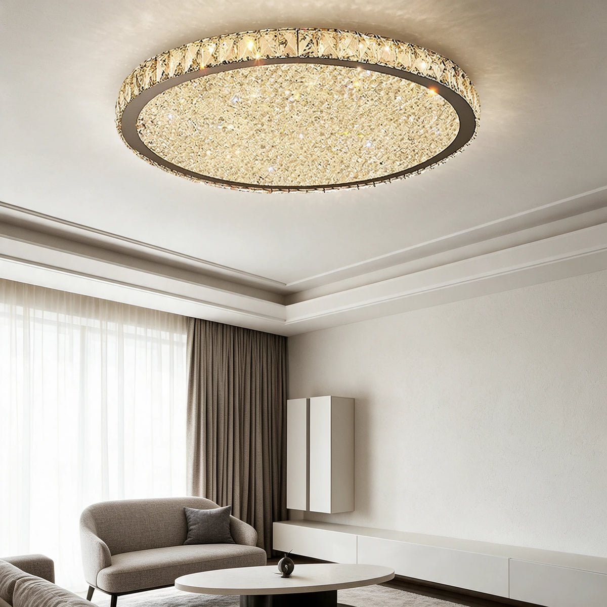 Raden crystal flush mount ceiling light in warm white above a living room with sheer curtains and a cream armchair