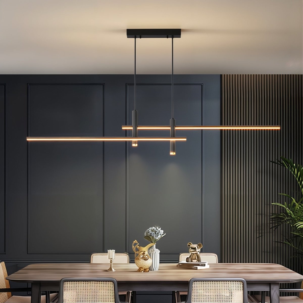 Minimalist rera black linear island chandelier illuminating a dark, sophisticated dining room interior