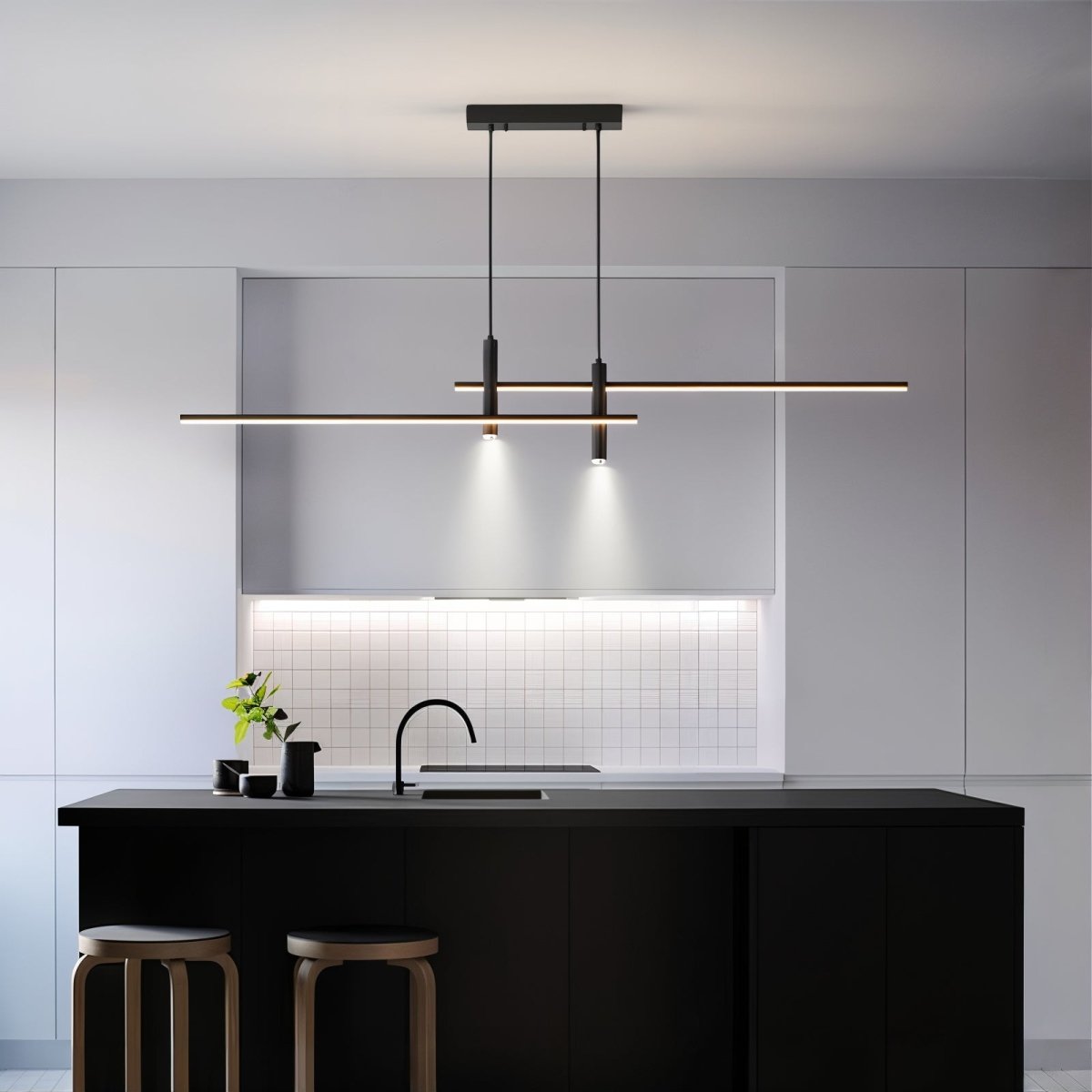 Modern black rera linear LED pendant providing bright, even illumination over a minimalist white kitchen island.