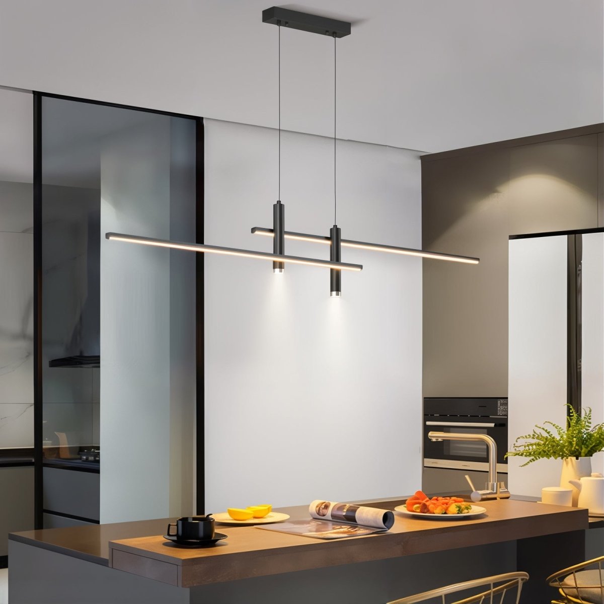Modern black rera linear LED pendant providing bright, even illumination over a minimalist white kitchen island