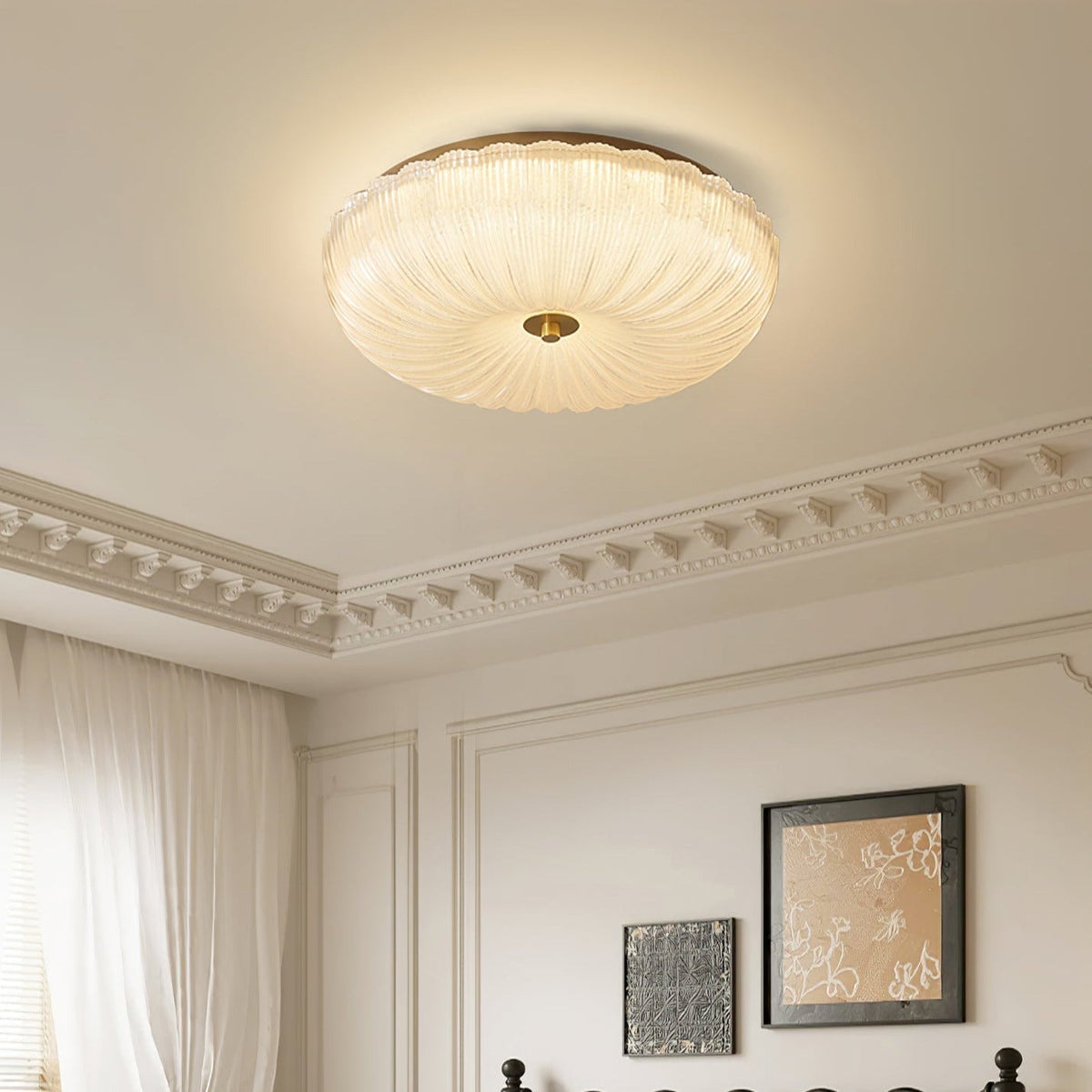 Elegant fluted glass rutyl flush mount installed on a ceiling with decorative crown moulding