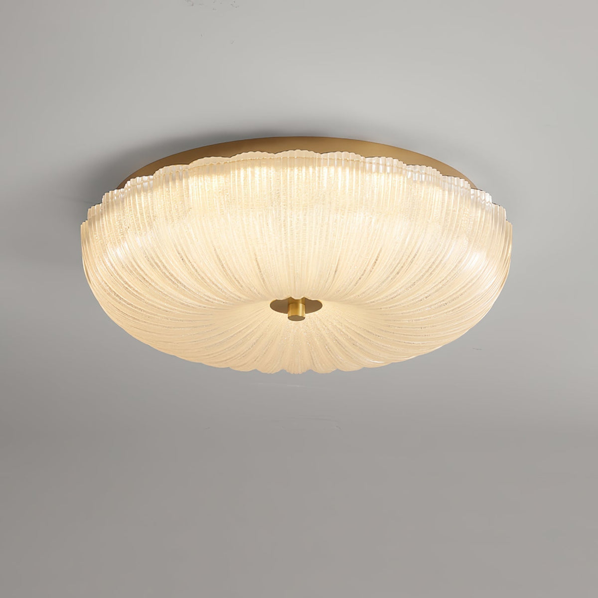 Illuminated ripple glass halo rutyl ceiling light showcasing its textured prismatic shade
