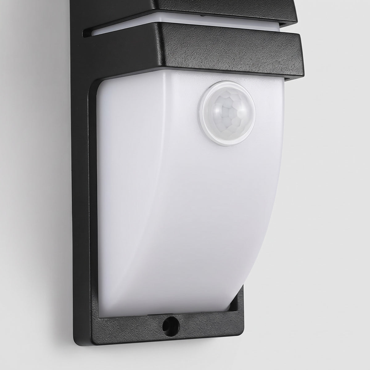 Close-up of the radar motion sensor lens on the Strata outdoor wall light