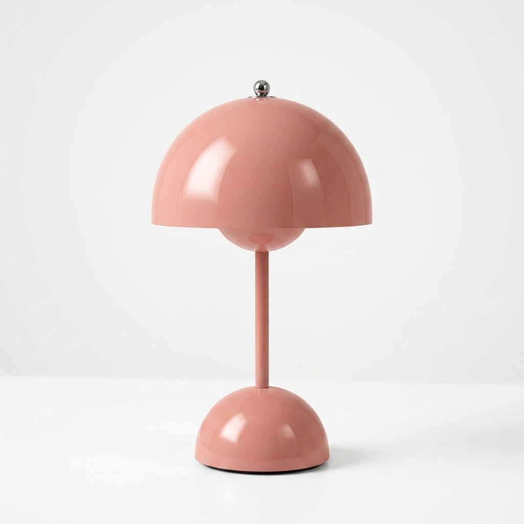 A modern sulba mushroom-shaped table lamp in a glossy dusty rose pink color, featuring a domed shade, a slim stem, and a matching domed base on a clean white background.