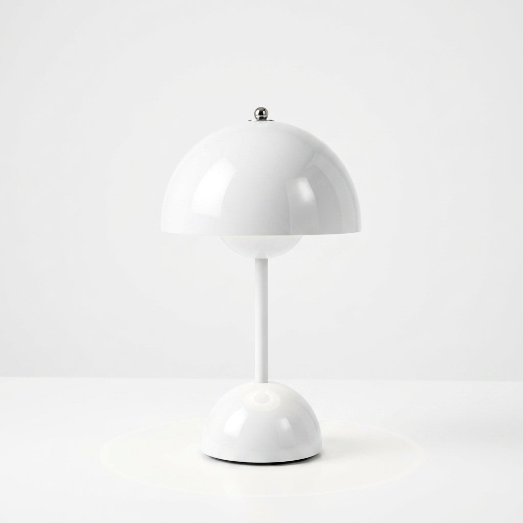 A modern sulba white table lamp with a glossy mushroom-shaped shade, a slim central stem, and a matching round base, photographed against a clean white studio background.