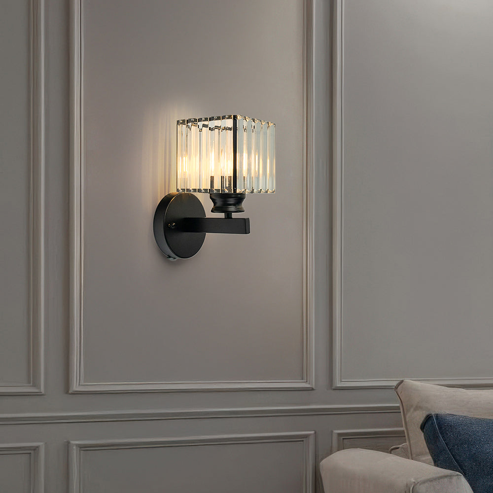 Black teja square crystal wall light adding luxury to a minimalist living room with panelled walls