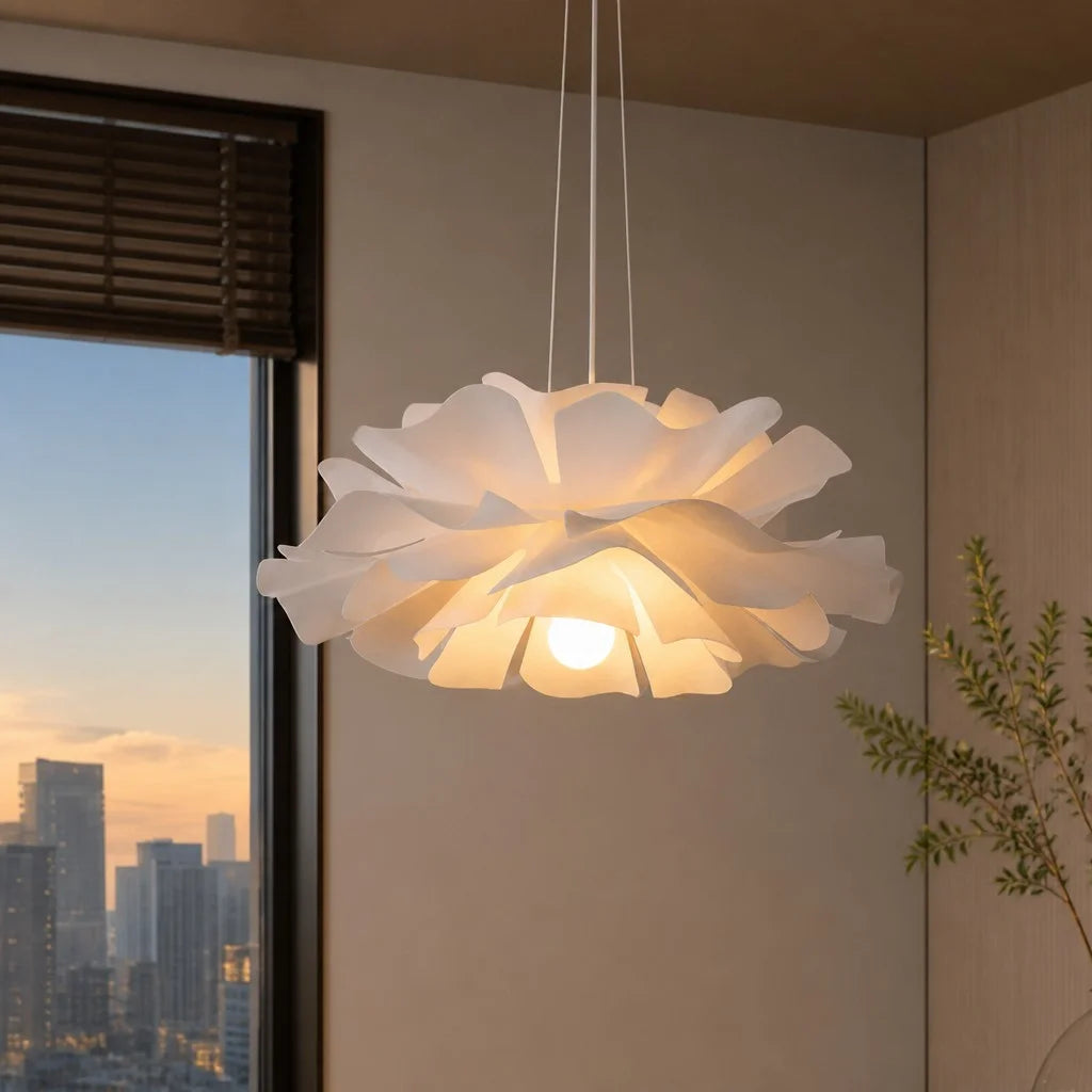 Modern telba white lotus pendant light illuminating a contemporary city apartment at dusk