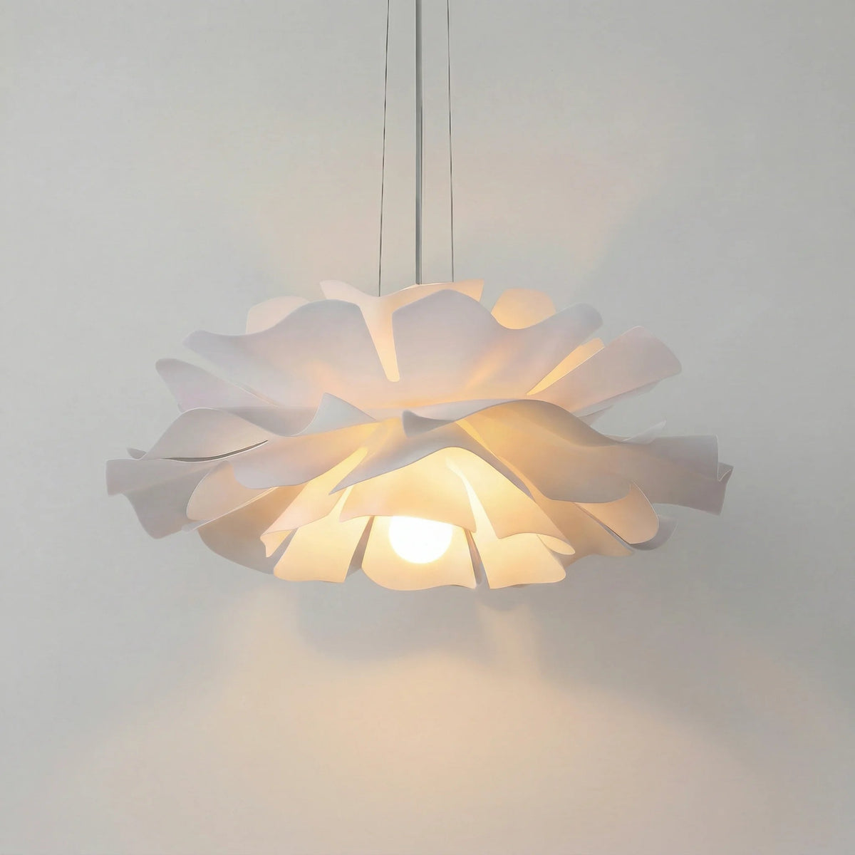 White telba acrylic floral chandelier showcasing its blooming lotus petal design