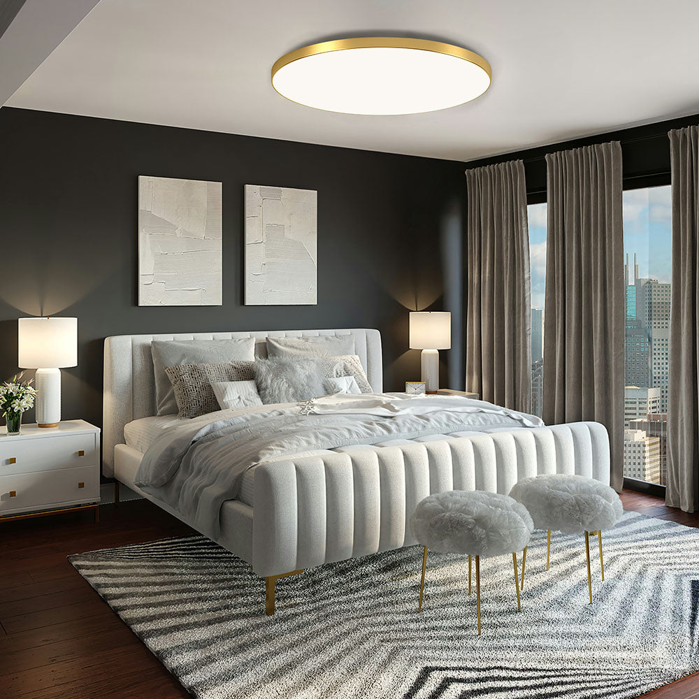 Modern gold LED tywa ceiling lamp installed in a stylish dark-toned bedroom