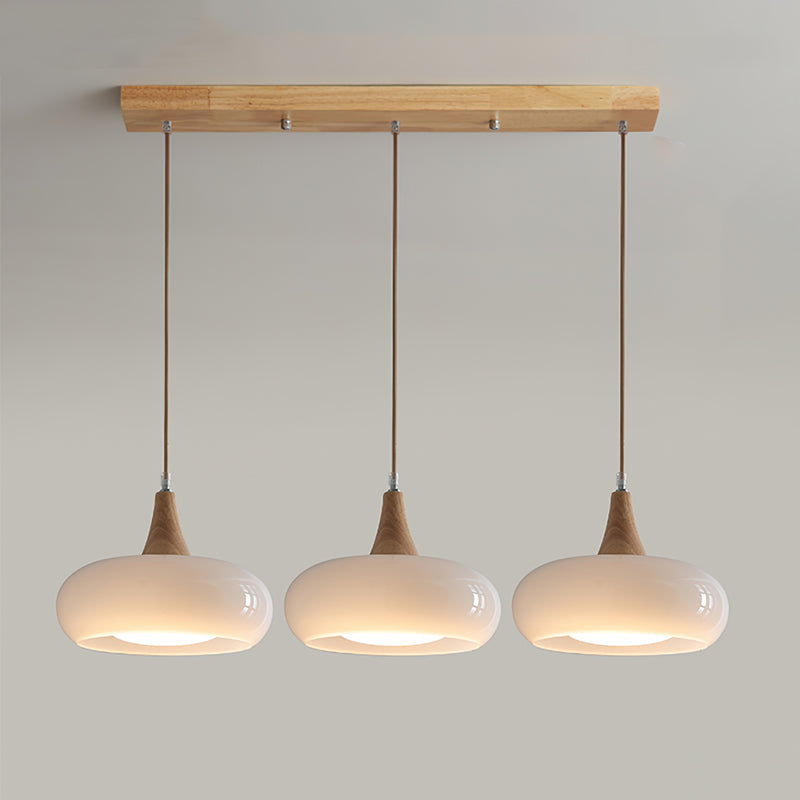 Front view of the 3-head white linear retro glass utul pendant chandelier