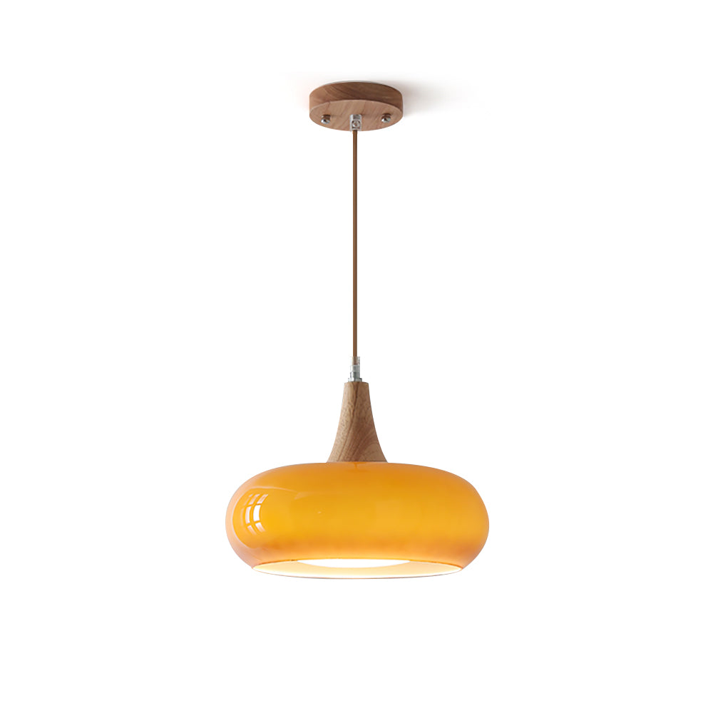 Isolated view of the vibrant orange mid-century utul glass pendant light with wood accent