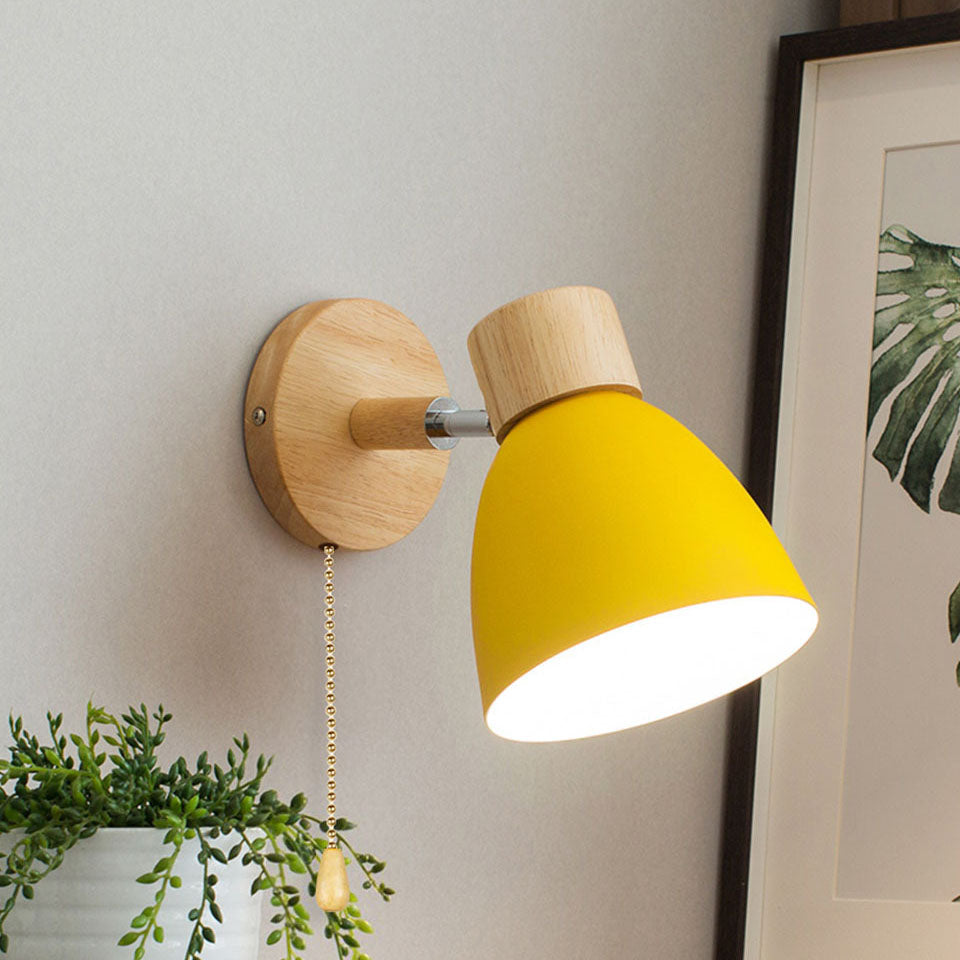 Yellow adjustable bedside vexol reading light with a pull cord, highlighting its premium wooden base