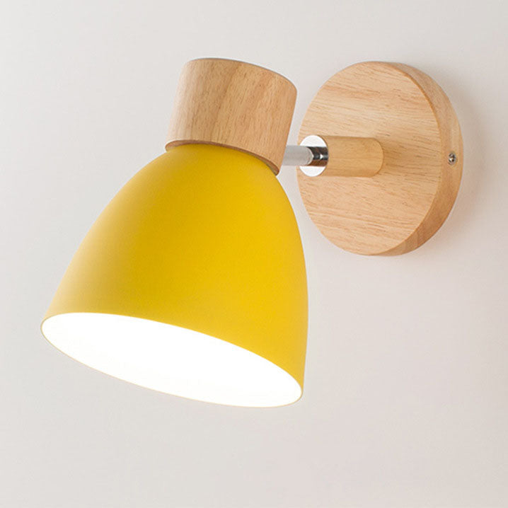 Yellow wood and metal dome vexol sconce without a pull cord, isolated on a light background