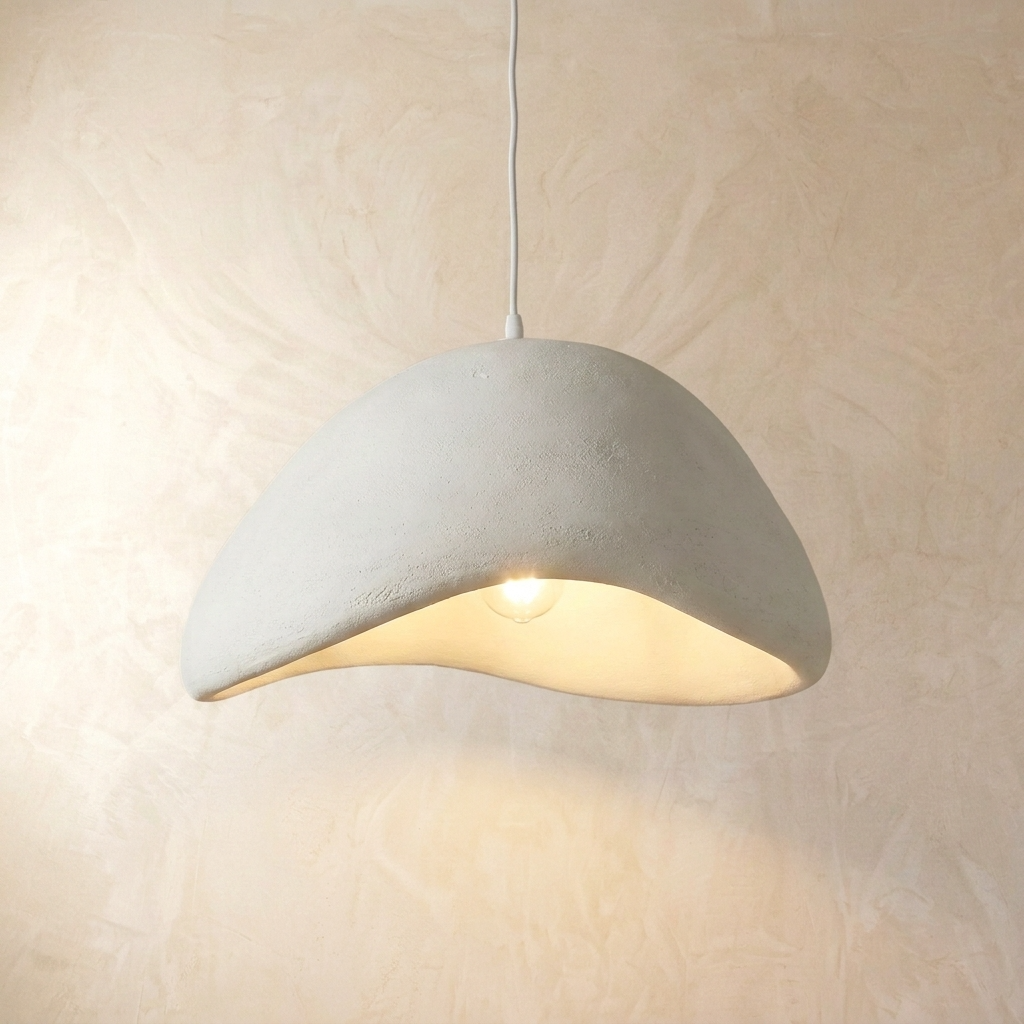 Asymmetrical white resin viwa ceiling lamp illuminating with a soft ambient glow
