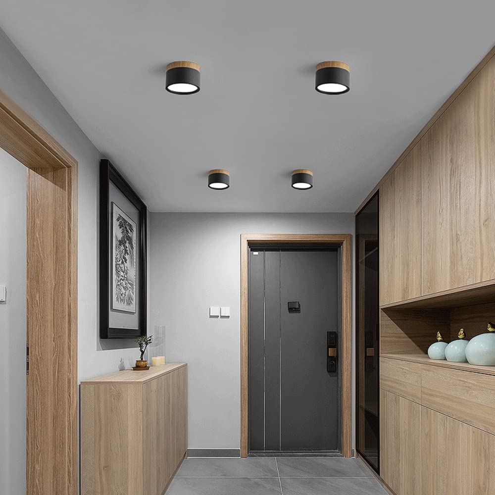 Black aluminium cylinder surface vytri spotlights installed on a hallway ceiling