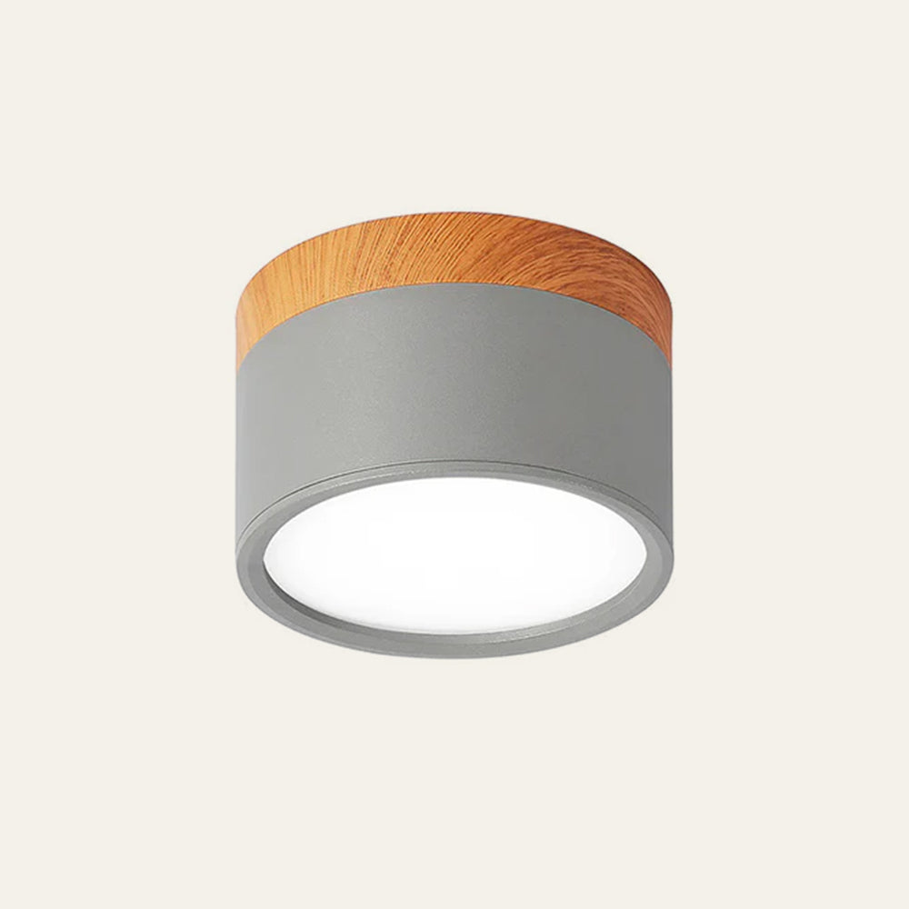 grey aluminium cylinder surface vytri spotlight with warm wood-effect detail