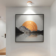 Modern white cylinder flush mount vytri ceiling light highlighting wall artwork in a minimalist room
