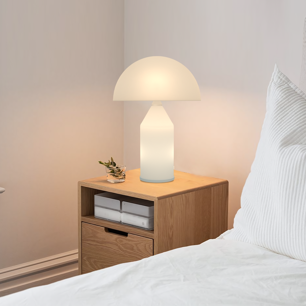 White mushroom wesk lamp providing glare-free illumination on a wooden bedside nightstand